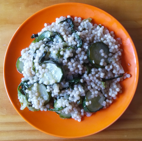How to cook couscous with cucumber and greens recipe